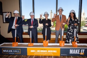 Interim President Jim Davis with Miriam and Jim Mulva, Ethan Burris, Vandana Nayak, and Hook 'em